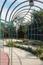 Diamond Park, arbor detail, ©1994<br>In collaboration with Philadelphia Green and architect John Lawson. Arbor detail, showing the night lighting element and one of the window-like openings framing the garden. <br>
Steel, paint, concrete, pigmented concrete, terrazzo and plantings. <br>
Site: 87' x 90' <br>
Commissioned by the Philadelphia Redevelopment Authority, Philadelphia, Pennsylvania