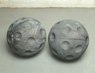Wiffle, ©1993<br>Lead over wood. (two pieces) <br>
14h x 14w (inches) diameter each <br>
Collection of the Pennsylvania Academy of Fine Arts 
