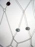 Winken (detail), ©2004<br>Epoxy, pigment, stainless steel bead chain and stainless steel chain. <br>
82h x 60w x 1.5d (inches) <br>
Estate of Charles Fahlen